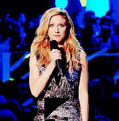 brittany-snow: Brittany Snow missing her cue, but making up for it with her cuteness.