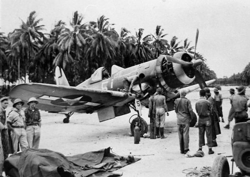 usaac-official:An F4U-1A of VF-17 under maintenance in the Solomons, 6 March 1944