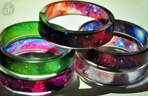 &ldquo;The Astronomer&rdquo; - resin bangles with glowing stars.Now available at Omnia Oddities by O