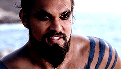 fetch-me-a-block:   His face was hard and cruel, his eyes as cold and dark as onyx.
