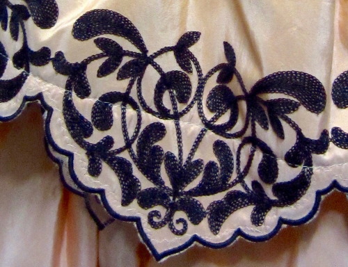 Extreme closeup: Aminta embroidery / lace(USA, Hamburg, USA, original Broadway, Copenhagen, World To
