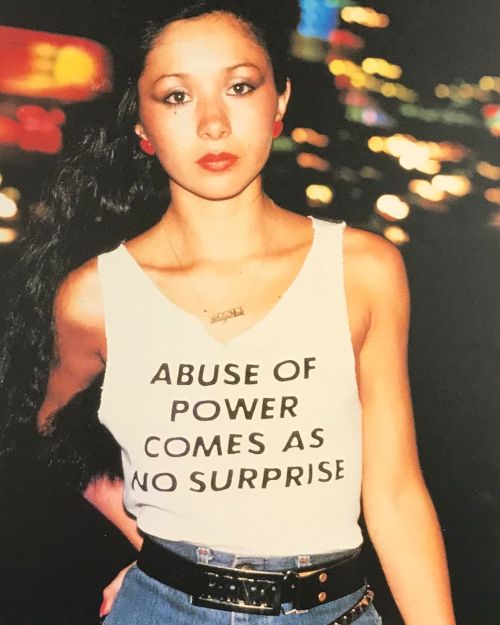 twixnmix: Graffiti artist Lady Pink photographed by Lisa Kahane wearing a Jenny Holzer  “