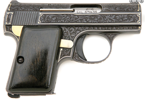 An engraved and gold inlaid Baby Browning pocket pistol.