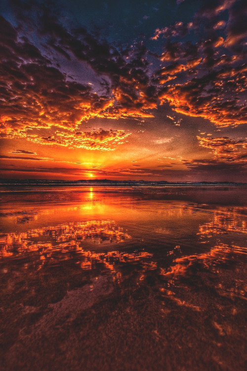 lsleofskye:Sunrise reflection by the beach | benmuldersunsets