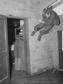 weirdvintage:  Man jumping outside a dressing