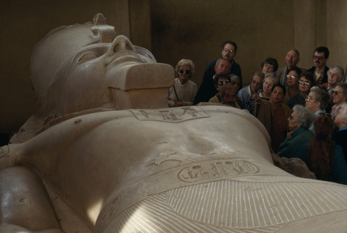 Museum tourists admire an enormous carving of Pharaoh Ramses II in Egypt, April 1991.Photograph by O