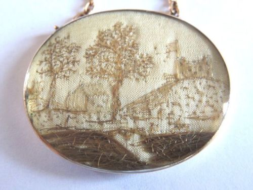 thingsunderglass:Georgian pendant (possibly a mourning object) composed of human hair embroidery on 