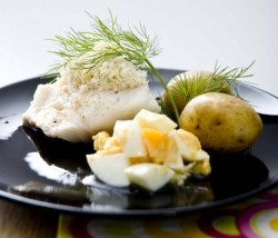 Boiled cod with chopped egg and horseradish