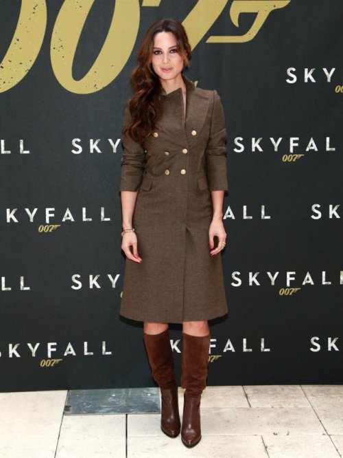 Bérénice Marlohe, James Bond Skyfall premiere.Salvatore Ferragamo military coat with T