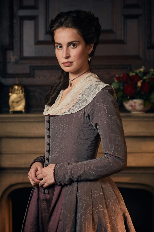 This purple dress with distinctive stitching throughout the fabric was first worn by Heida Reed as E