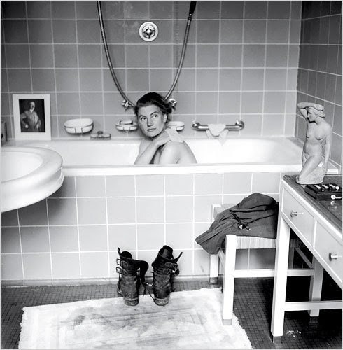 Lee Miller in Adolf Hitler’s bathtub, Munich 1945, photo by David E. SchermanAdolph’s Tub, a v