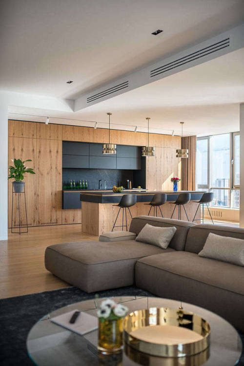 remodelproj:Matching wood cabinets to wood flooring - contrasted with black cabinets &amp; seati