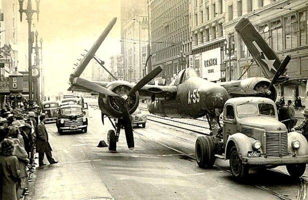 flytofight:  Grumman F7F Tigercat being towed down a city street, looks like NY.