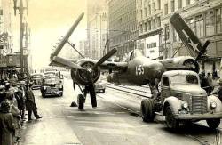 flytofight:  Grumman F7F Tigercat being towed down a city street, looks like NY. Who has the background on this?! 