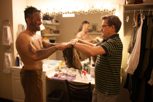 Ramin Karimloo gets a helping hand with a costume piece from dresser Lyle Jones. Photo by maxgordonp