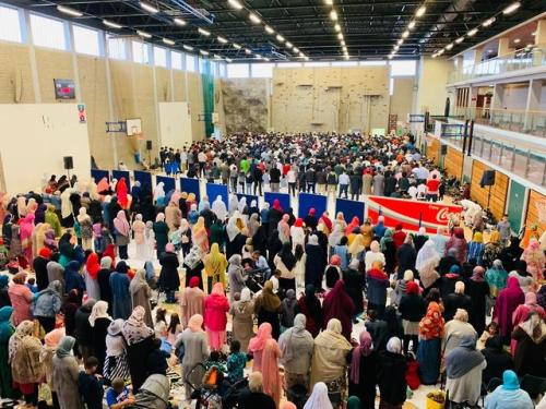 “Eid prayer Belfast. The second basketball hoops on the picture mark the middle of the room. As you 
