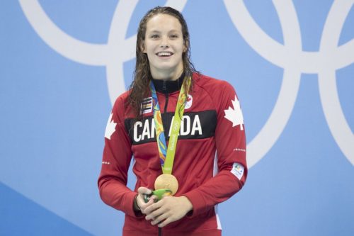 Penny Oleksiak ties for GOLD and a new Olympic Record with a time of 52.70 in the 100m Freestyle!Fir