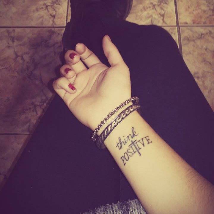 Little Tattoos — Little wrist tattoo saying “Think positive”, with...