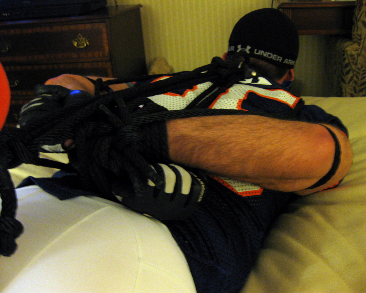 bondagejock:  Hogtied in football, from multiple angles. 