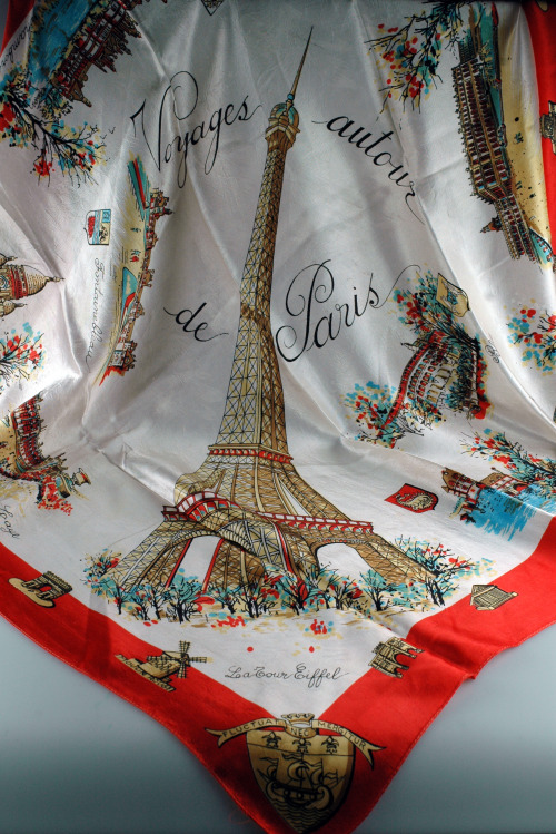 Acetate satin travel souvenir scarf, with machined turnings. White ground with ‘VOYAGES AUTOUR