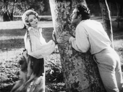 littlehorrorshop:Lillian Gish and John Gilbert flirt in La Bohème, 1926