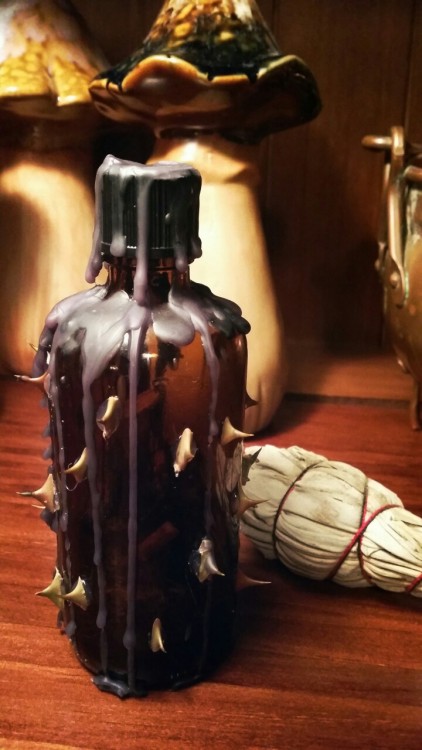 oldmotherredcap: New home, new witch bottle.Surrounded by actual rose thorns, finger printed and sea