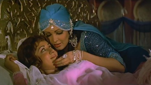 aphroditeinfurs:1. Parveen Babi lulls Hema Malini to sleep in Razia Sultan (1983)2. Asha Parekh