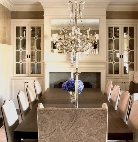 Traditional Dining Room - EnclosedLarge Elegant Dark Wood Floor Enclosed Dining Room Photo With Beige
