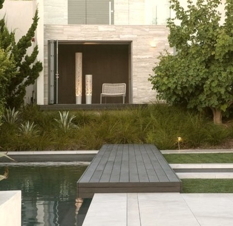 Contemporary Pool - LapExample Of A Large Trendy Stone And Rectangular Lap Pool Design