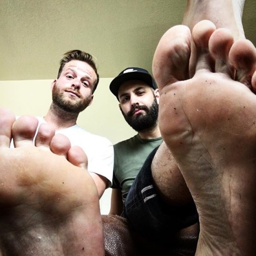 Two hot fuckers showing off their dirty smelly feet