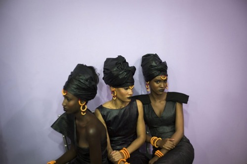 unearthedviews:Paris, France: Models wearing Adama Paris creations wait backstage before the Black F