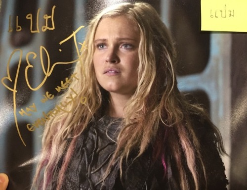 Eliza signing for me and for my friend. My friend asked me to ask her to write her name in Thai (it&