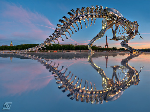Giant Chrome T-Rex Installed on the Seine River in Paris by Philippe Pasqua Photo by Anthony Gelot