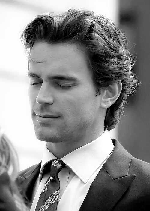 White Collar Matt Bomer as Neal Caffrey Smiling in Black and White