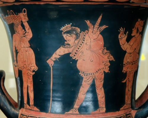 Scene from a phlyax (mythological burlesque) play, showing Zeus as a pot-bellied old man walking wit