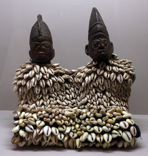 Yoruba twin statuettes covered with shells.  Artist unknown; 20th century.  Now in theMusée du quai 