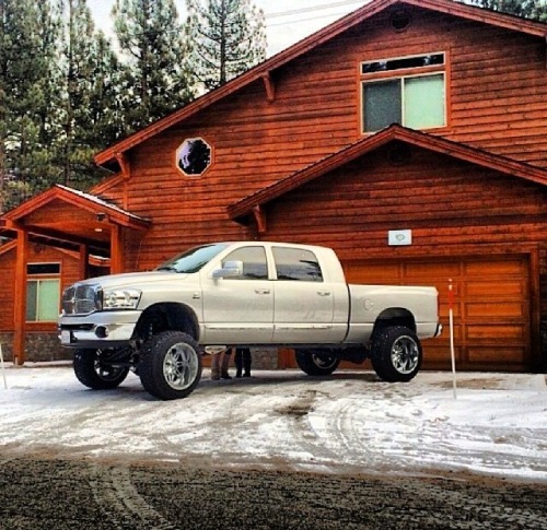 chevy-raised-jack-daniels-fed:  thebadandgood:   I want this cummins and the house.   When will people stop putting big ass rims and small ass tires on trucks!?  Trade out the tires and rims and I’ll take both!