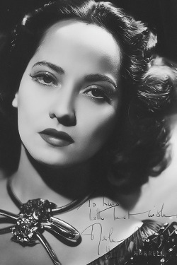 A signed photograph of Merle Oberon, photographed