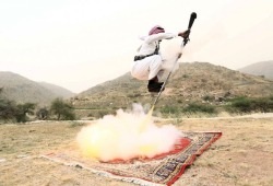 peashooter85:Saudi Arabian man performing a traditional dance with a musket.