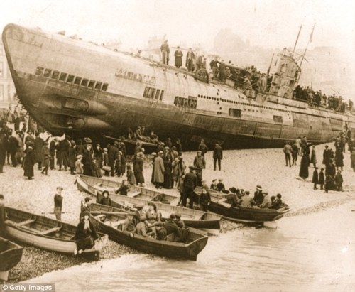 The German submarine U-118, which surrendered at the end of World War I.  The U-Boat was being towed