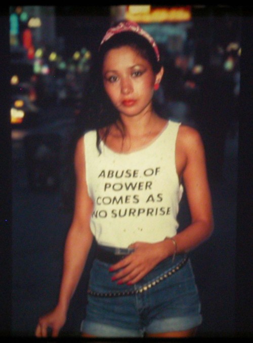 twixnmix: Graffiti artist Lady Pink photographed by Lisa Kahane wearing a Jenny Holzer  “