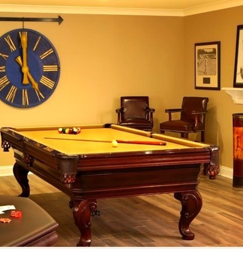 Traditional Basement - BasementInspiration For A Large Timeless Underground Ceramic Tile Basement Remodel