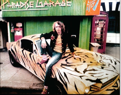 4apostrophe:   Trevor Myles on his flocked Tiger Stripe 1968 Ford Mustang outside Paradise Garage,  430 King’s Road, in 1970. Photo: Tim Street-Porter.  