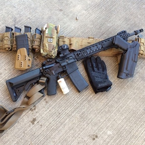 praetordefense:  One of our fav equipment #praetordefense #igmilitia #kac #knightsarmament #ar15 #hsg #tacos #mechanix #glock #glock17 #fireclean #safariland #aimpoint #benchmade 