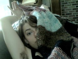 squabattack:  The blanket, she progresses. It is perhaps two feet long now, maybe a bit longer… Also yay for not shaving. 