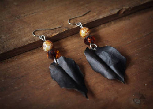  A pair of handmade leaf earrings, super light and crafted from up-cycled raw deer hide.Bathed in Fi