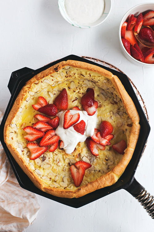 Almond Dutch Baby with Vanilla Crème Fraîche and Strawerries