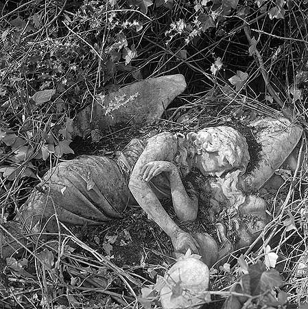 A statue of a sleeping angel in Highgate Cemetery