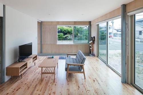 leibal - Umbrella and Enclosure is a minimalist home located in...