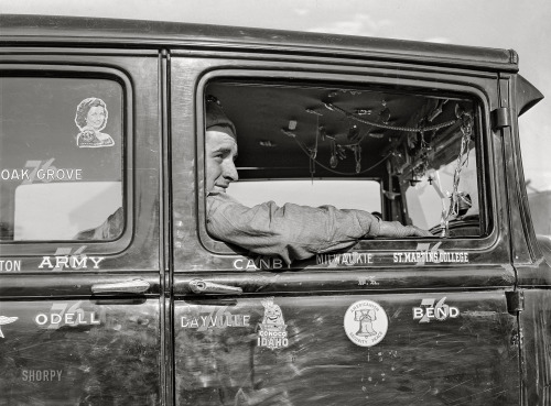 Migrant agricultural worker in his automobileTrinkets in migrant agricultural worker’s automob